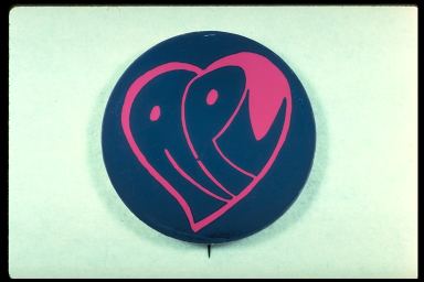 APL (BLUE BUTTON WITH PINK HEART SHAPE WITH DOTS FOR EYES)
