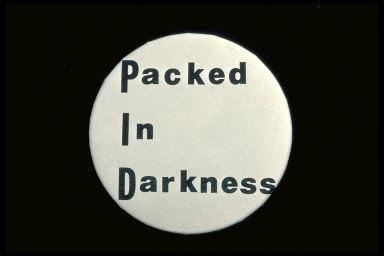 PACKED IN DARKNESS